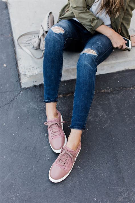 pink sneakers on boyfriend jeans